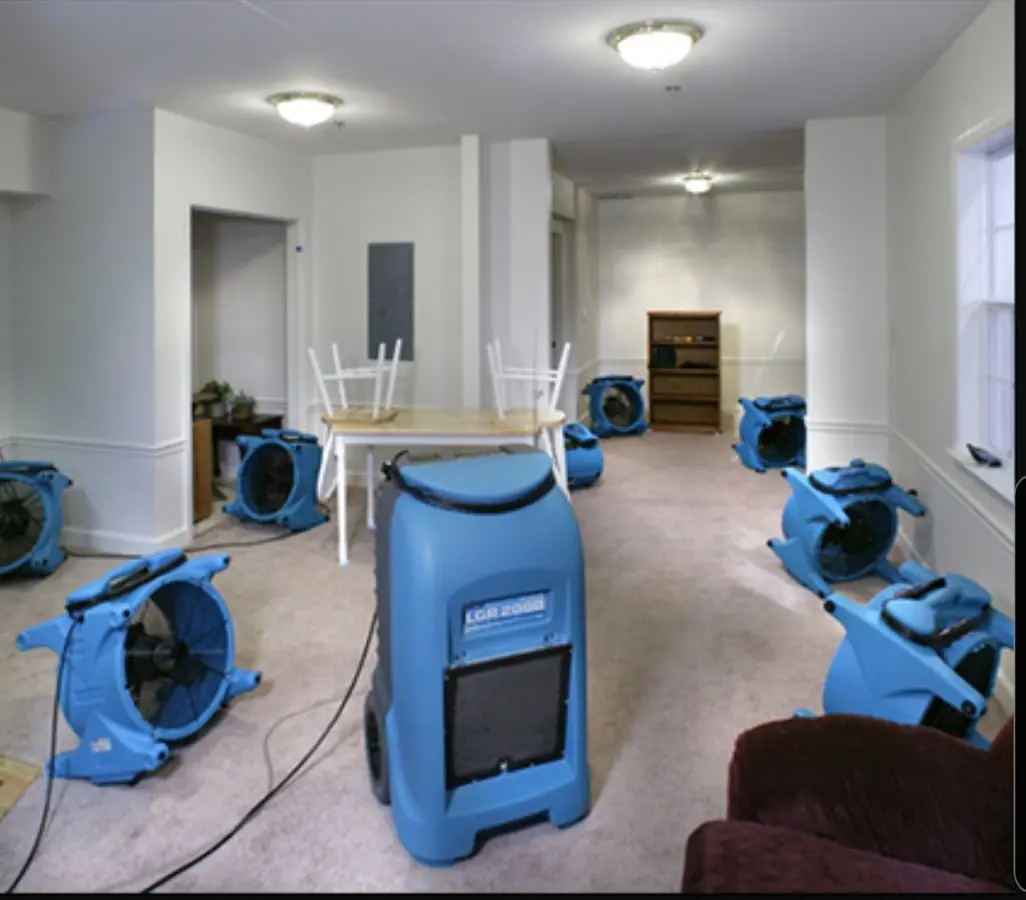 Air movers and dehumidifier setup for Water Damage Restoration in Dodge City